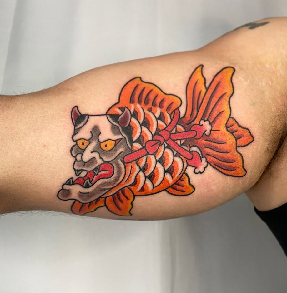 Japanese-style oni and koi tattoo by Manny Abete